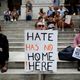 A protester holds a banner reading “Hate Has No Home Here” during a rally in New York City on Aug. 14, 2017, against President Donald Trump for threatening North Korea and Venezuela with an attack. (Mohammed Elshamy/Anadolu Agency/Getty Images)